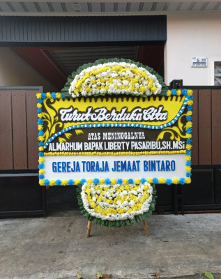 Papan Bunga Duka di Marikit